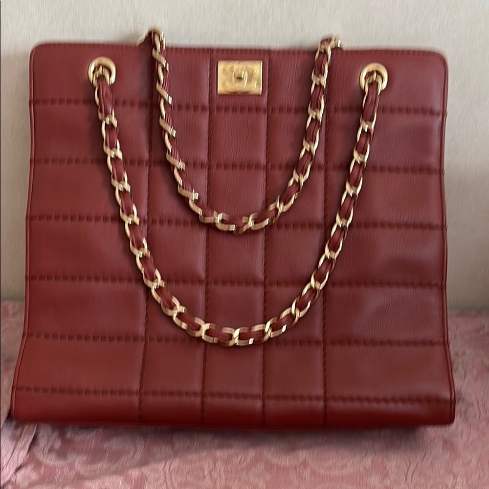 CHANEL Quilted Brown Leather Bag with Gold Chain